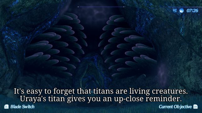 Image: Tendril-like purple villae lining a small cave's walls.
Text: It's easy to forget that the titans are living creatures. Uraya's titan gives you an up-close reminder.